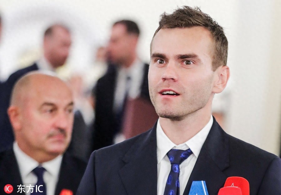 普京接见俄罗斯男足并为其颁奖 将帅正装亮相克林姆林宫